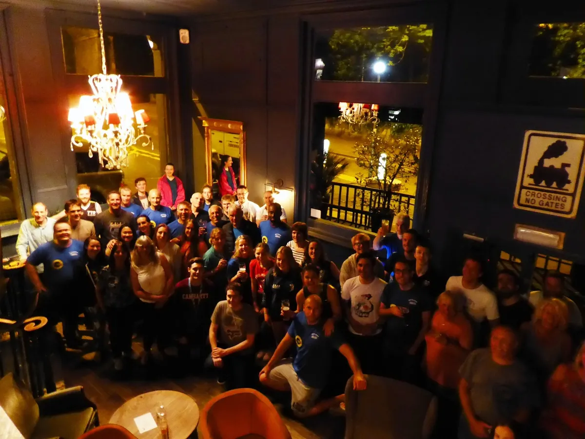 Award ceremony celebrating top swimmers and fundraising total