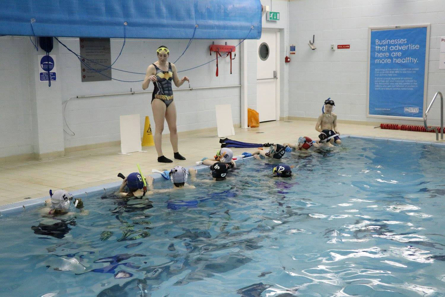 Coach Ellie at poolside
